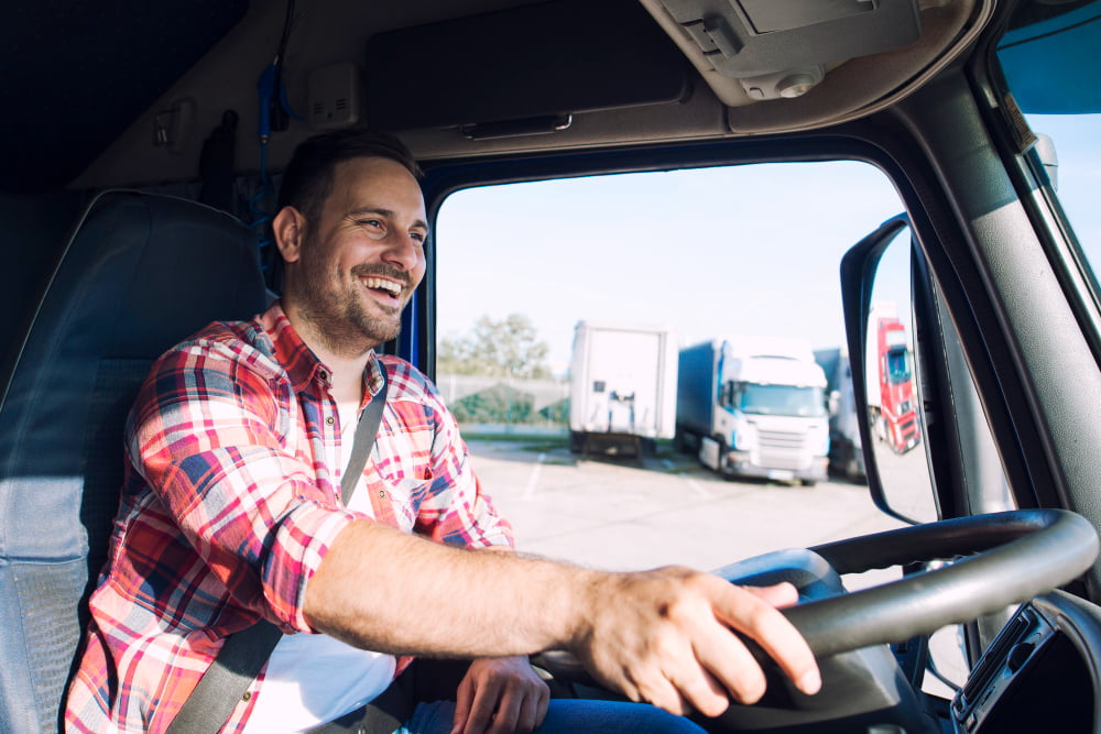 professional middle aged truck driver casual clothes driving truck vehicle delivering cargo destination